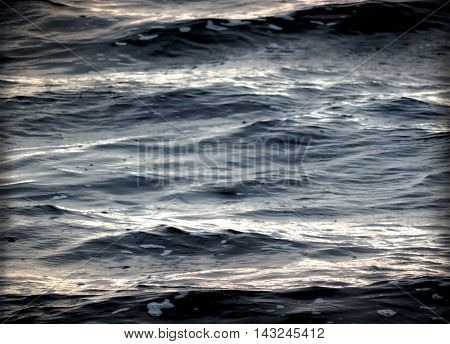 Stormy sea, black water background or texture.