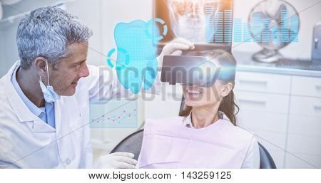 Digitally generated image of a teeth against female patient virtual reality headset during a dental visit