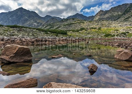 Reflection of Musala peak in Musalenski lakes,  Rila mountain, Bulgaria
