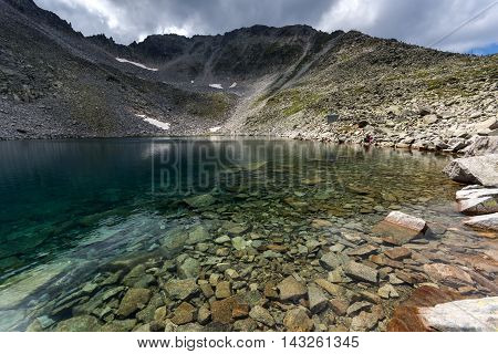 Amazing view of Ledenoto (Ice) Lake, Musala Peak and Trionite, Rila mountain, Bulgaria