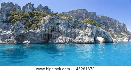 Panorama Of Blue Sea And The Rocky Coast In The Gulf Of Orosei Sardinia Italy