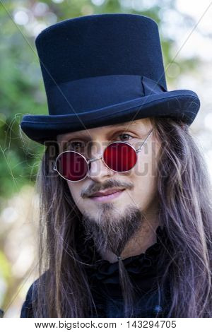 CAGLIARI, ITALY - May 29, 2016: Sunday at La Grande Jatte VIII Ed. At the Public Gardens - Sardinia - portrait of a man in Victorian costumes
