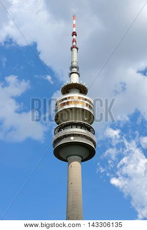 MUNICH GERMANY - AUGUST 4 2015: Detail of the Olympic Tower in Munich. Germany. It was built for the 1972 Summer Olympics. It has an overall height of 291m and a weight of 52500 tons.
