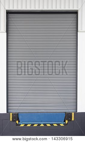 Dock leveler and shutter door use for product transfer to truck.