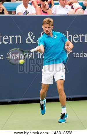 Mason Ohio - August 16 2016: David Goffin in a match at the Western and Southern Open in Mason Ohio on August 16 2016.