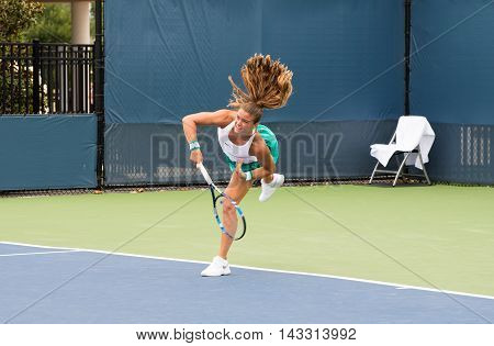 Mason Ohio - August 13 2016: Maria Sakkari in a qualifying match at the Western and Southern Open in Mason Ohio on August 13 2016.