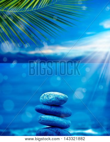 close up shot of stone pile over sea and morning sky.