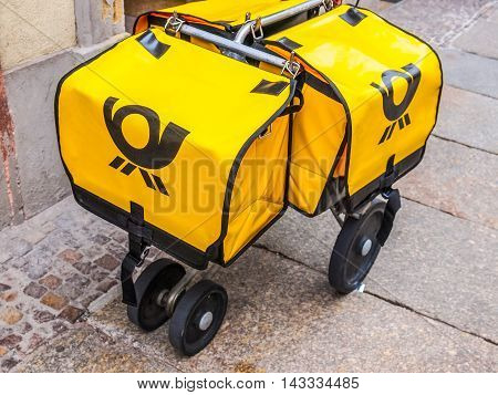 LEIPZIG GERMANY - JUNE 14 2014: Deutschepost German post delivery vehicle for city centre (HDR)