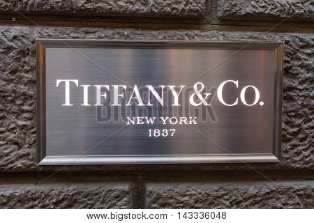 Florence Italy - July 05 2016: emblem with the logo of Tiffany and Co. Tiffany and Company is an American luxury jewelry and specialty retailer headquartered in New York City