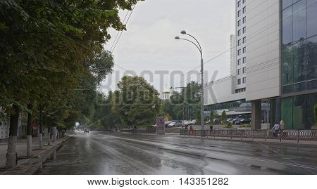 Rostov-on-Don Russia -August 142016: On Bolshaya Sadovaya after the rain moving cars and citizens