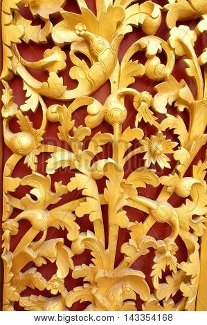 the beautiful gold of pattern Lai Kanok (Thai design) in wood