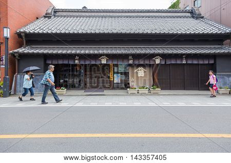 KAWAGOE JAPAN - 20 JULY 2016 - Asian people walk around in Kawagoe town Japan on July 20 2016.