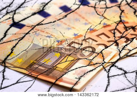 50 Euros and cracks - Finance Concept
