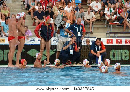 Budapest, Hungary - Jul 17, 2014. Montenegro's PEROVIC Ranko head coach talking about the tactics. The Waterpolo European Championship was held in Alfred Hajos Swimming Centre in 2014.
