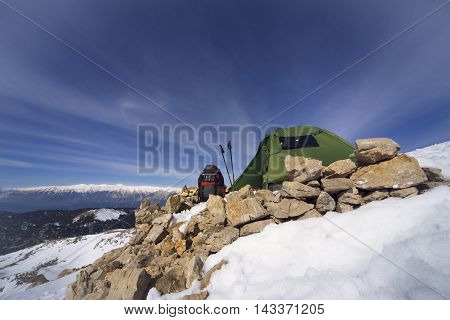 Camping on the top of the mountain in winter.