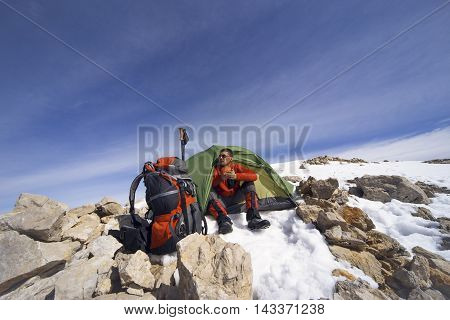 Camping on the top of the mountain in winter.