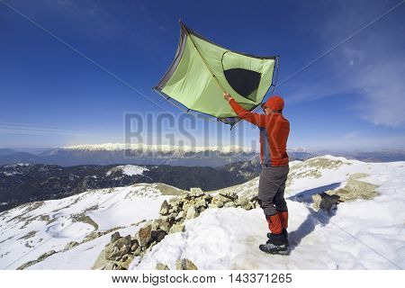 Camping on the top of the mountain in winter.