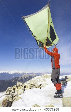 Camping on the top of the mountain in winter.