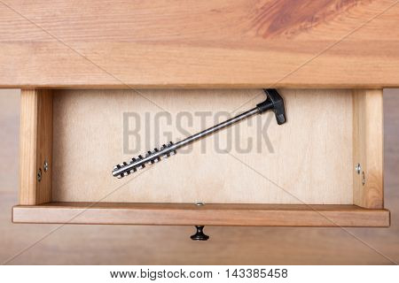 One Latchkey In Open Drawer