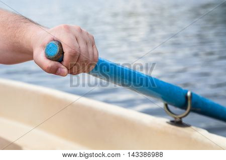 Rower's Hand Holding Oar Close Up