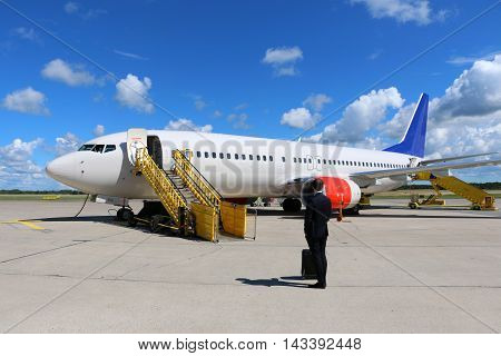 Airliner and passenger, at Visby Airport, Gotland, Sweden