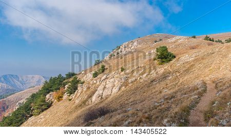 Panoramic landscape with hiking path on a mountain pasture Demerdzhi Crimean peninsula