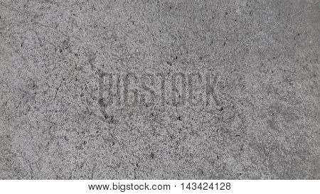 Gray concrete wall texture with small droplets