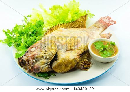 grilled fish Mixed with salt and vetgetable, thai food