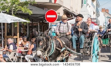 Antique Cart Pulled By A Donkey In The Streets Of The City