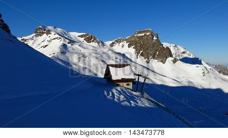 Station of a chair-lift and mountains in the Flumserberg ski area Switzerland.