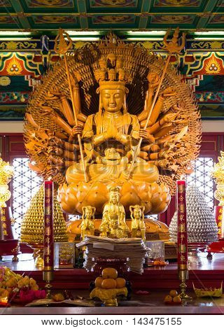 wood Guan Im thousand hand in Buddism