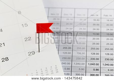 Red Pins to Wildcats on the calendar beside the Twenty-nine number of month in business concept.