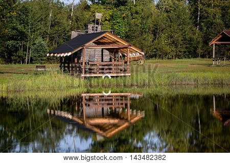 Old historic village with wooden cottages rus