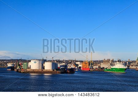 ABERDEEN SCOTLAND - 30 January 2016: Big supply boats in Aberden harbor on 30 January 2016. Aberdeen port is one of the busiest ports in UK.
