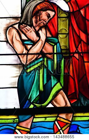 Poissy France - august 6 2016 : stained glass window of the historical collegiate church where the king Saint Louis was baptised