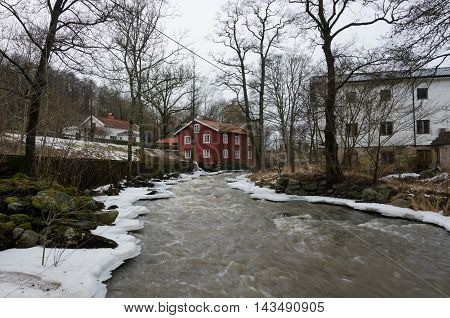 Kungsbacka river with cold water one grey day in early spring