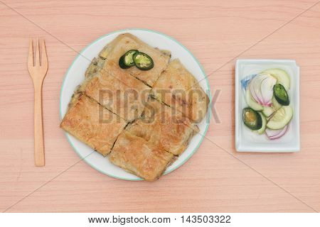 Martabak or murtabak is a stuffed pancake is arab food.