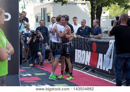 Copenhagen, Denmark - August 21, 2016: Winner Patrik Nilsson congratulating the 2nd Will Clarke in men's at the KMD Ironman Copenhagen 2016