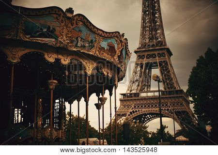 PARIS, FRANCE - MAY 13: Carrousel and Eiffel Tower on May 13, 2015 in Paris. With the population of 2M, Paris is the capital and most-populous city of France