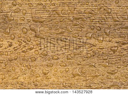 Oak background with raindrops - Great wooden background with a section from an oak plank with water drops on it. The wood, which is treated with a special oil, is waterproof.