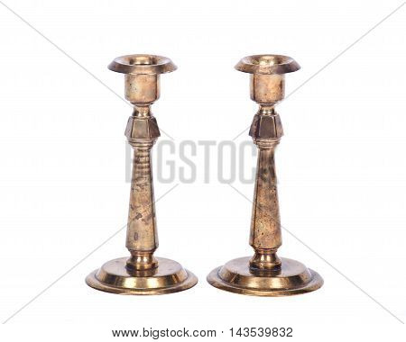 Vintage brass candle holder separated on white background
