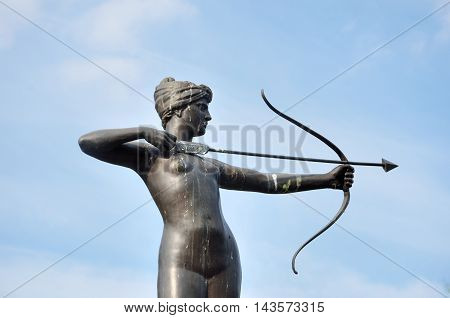 Statue of Huntress Diana with Blue Sky
