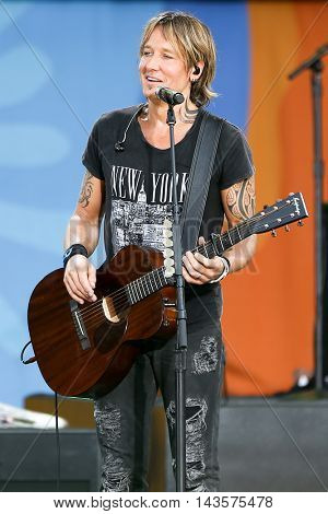 NEW YORK-AUG 12: Keith Urban performs in concert on ABC's 
