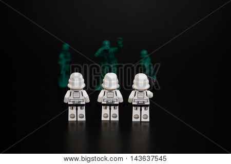 Orvieto Italy - November 22th 2015: Group of Star Wars Lego Stormtroopers minifigures repair vs. human soldier. Lego is a popular line of construction toys manufactured by the Lego Group