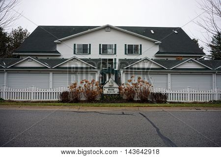 WEQUETONSING, MICHIGAN / UNITED STATES - DECEMBER 22, 2015: The Pennsylvania House is a condominium on Pennsylvania Avenue in Wequetonsing.