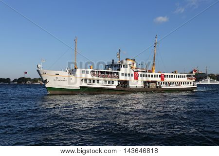 ISTANBUL TURKEY - JULY 25 2016: Sehir Hatlari ferry carry passengers between Asian side to European side of Istanbul. Sehir Hatlari was established in 1844 and now carry 150000 passengers a day.