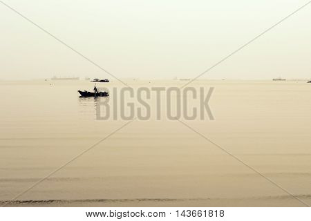 fishing boat and sea in the evening