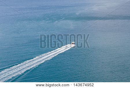 Amazing trip by boat on the sea. Summer adventure. Little boat in the sea
