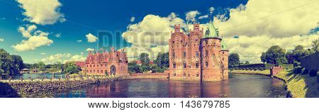 Egeskov Castle, located in the south of the island of Funen, Denmark. Vintage look.
