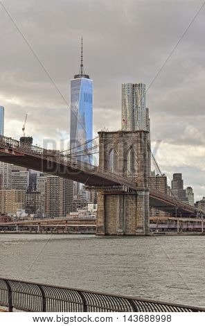Fragment of the Brooklyn Bridge at cloudy day.